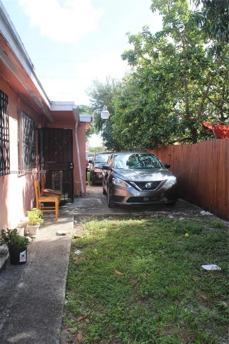 view of yard featuring fence