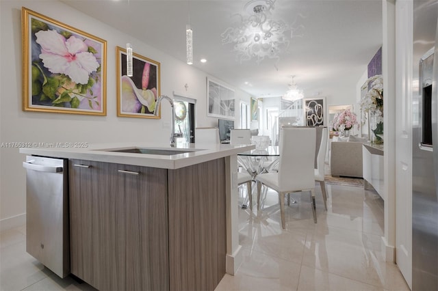 8321 Central Park Blvd, Doral, FL 33166 - kitchen with dishwasher, modern cabinets, an inviting chandelier, and a sink