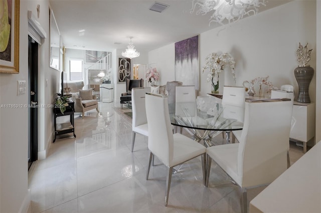 8321 Central Park Blvd, Doral, FL 33166 - dining space with a notable chandelier and visible vents