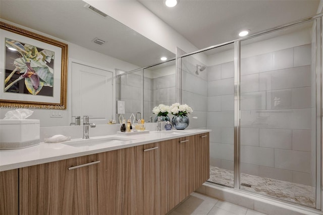 8321 Central Park Blvd, Doral, FL 33166 - full bathroom featuring visible vents, vanity, a shower stall, and tile patterned flooring