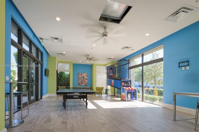 8321 Central Park Blvd, Doral, FL 33166 - game room with visible vents, wood finished floors, and a ceiling fan