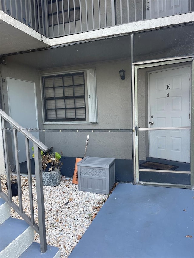 property entrance with board and batten siding