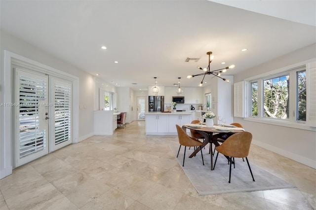 13575 SW 72nd Ave, Pinecrest, FL 33156 - dining room featuring plenty of natural light, a chandelier, and recessed lighting