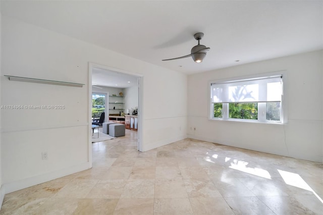 13575 SW 72nd Ave, Pinecrest, FL 33156 - empty room featuring ceiling fan and baseboards