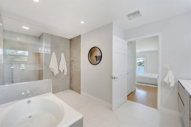 13575 SW 72nd Ave, Pinecrest, FL 33156 - bathroom featuring vanity, tiled shower, connected bathroom, a bath, and recessed lighting