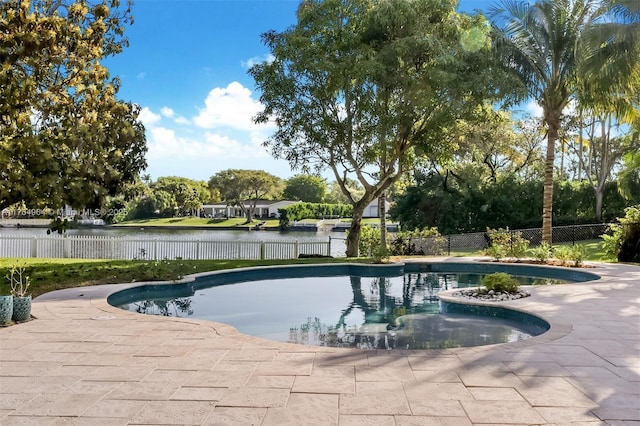 13575 SW 72nd Ave, Pinecrest, FL 33156 - view of swimming pool with a water view and a patio area