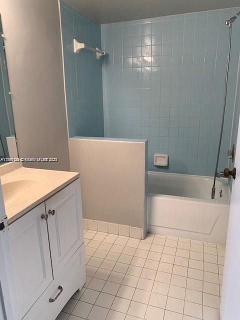 full bath featuring shower / washtub combination, vanity, and tile patterned flooring