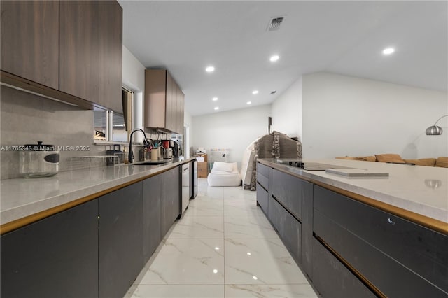 kitchen with modern cabinets, a sink, marble finish floor, recessed lighting, and open floor plan