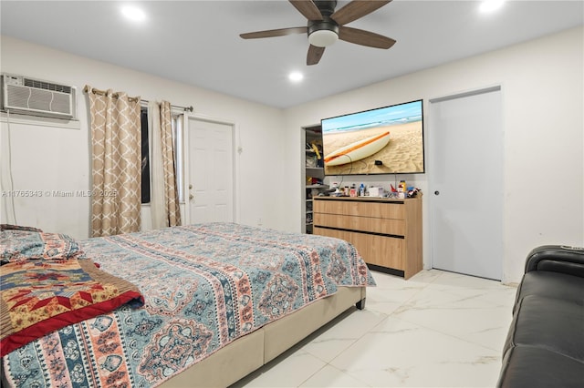bedroom with a ceiling fan, a closet, an AC wall unit, marble finish floor, and recessed lighting