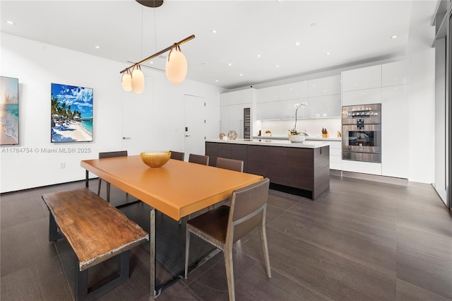 dining space with recessed lighting