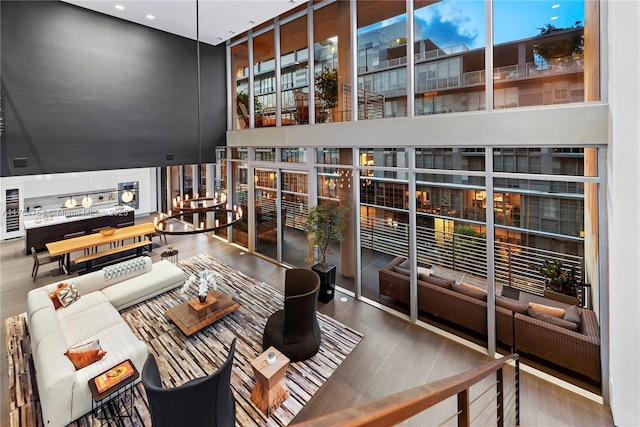 interior space featuring wood finished floors and floor to ceiling windows