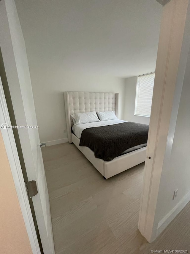 bedroom with baseboards