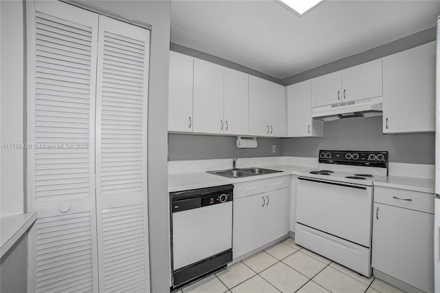 kitchen with white appliances, a sink, light countertops, white cabinets, and under cabinet range hood
