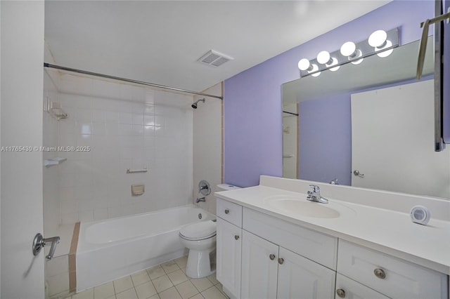 bathroom with visible vents, toilet, shower / tub combination, tile patterned flooring, and vanity