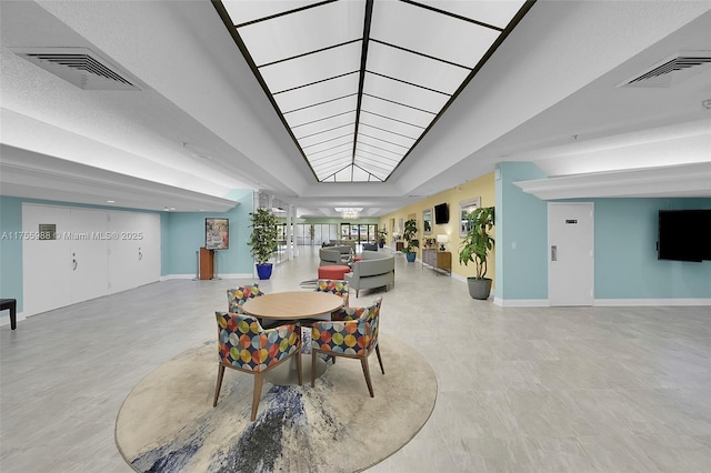 dining room with visible vents and baseboards