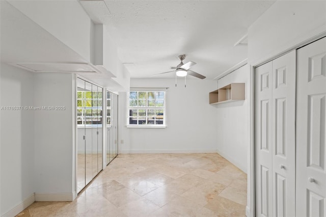6961 SW 152nd St, Palmetto Bay, FL 33157 - unfurnished bedroom featuring baseboards and ceiling fan