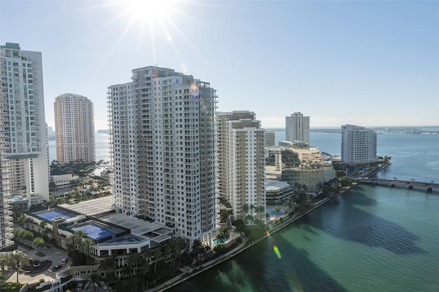 exterior space featuring a city view and a water view