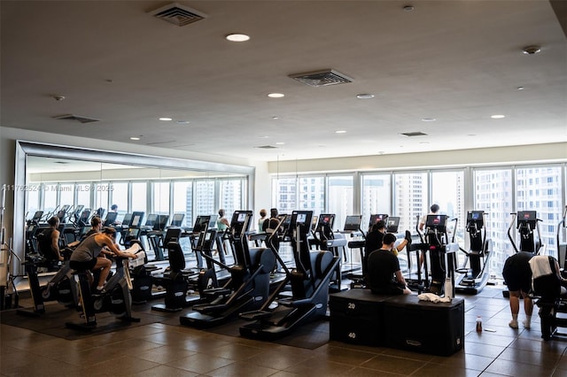 exercise room with recessed lighting and visible vents