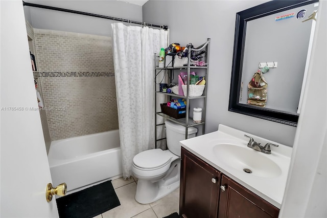full bath featuring tile patterned floors, toilet, vanity, and shower / tub combo