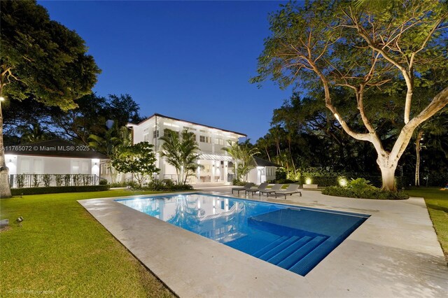 4550 Sunset Dr, Coral Gables, FL 33143 - swimming pool with a lawn and a patio