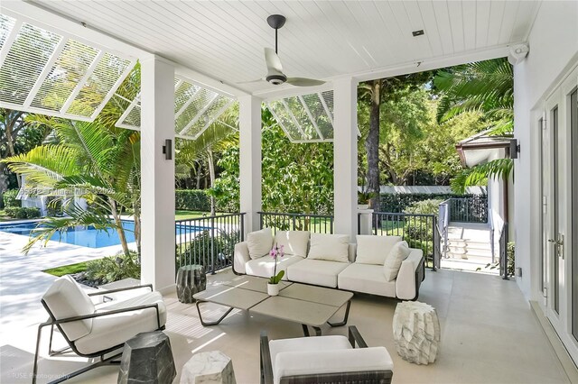 4550 Sunset Dr, Coral Gables, FL 33143 - view of patio with outdoor lounge area and ceiling fan