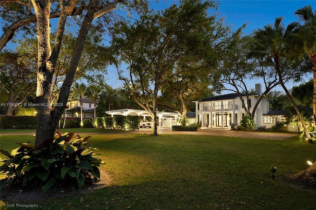 4550 Sunset Dr, Coral Gables, FL 33143 - view of grassy yard with a balcony