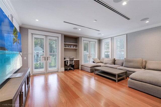4550 Sunset Dr, Coral Gables, FL 33143 - living area featuring crown molding, french doors, light wood-style flooring, an office area, and recessed lighting
