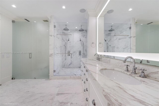 4550 Sunset Dr, Coral Gables, FL 33143 - bathroom featuring a marble finish shower, double vanity, and recessed lighting