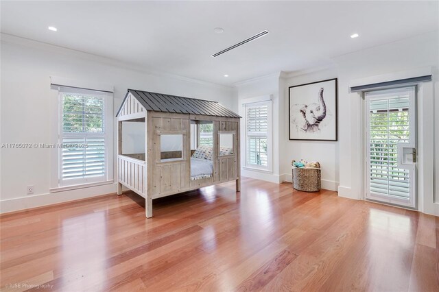 4550 Sunset Dr, Coral Gables, FL 33143 - bedroom with access to exterior, crown molding, multiple windows, and recessed lighting