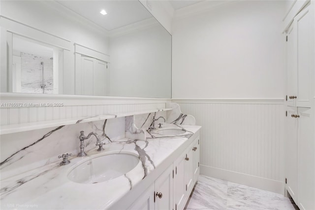 4550 Sunset Dr, Coral Gables, FL 33143 - full bath with double vanity, crown molding, a wainscoted wall, a shower, and marble finish floors