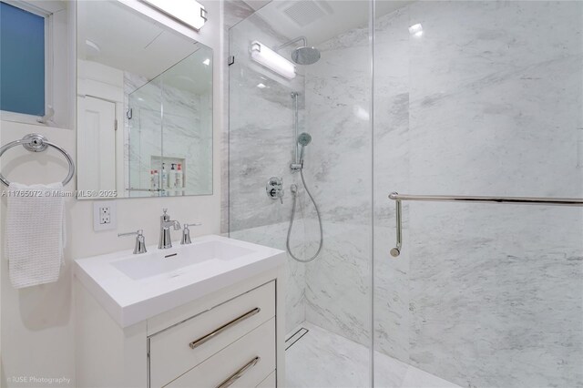 4550 Sunset Dr, Coral Gables, FL 33143 - bathroom with a marble finish shower and vanity