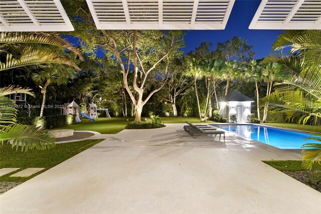 4550 Sunset Dr, Coral Gables, FL 33143 - outdoor pool with a playground and a patio