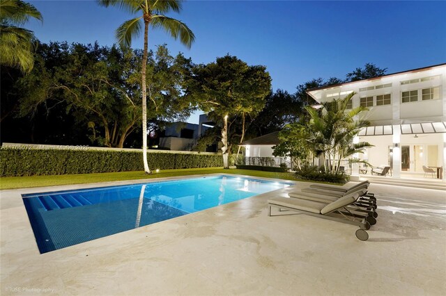 4550 Sunset Dr, Coral Gables, FL 33143 - view of swimming pool featuring a patio area
