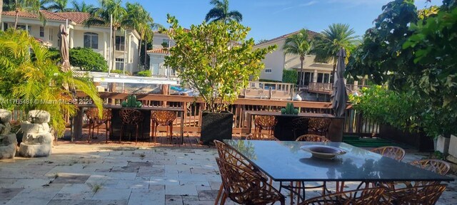 949 Harbor Vw N, Hollywood, FL 33019 - view of patio / terrace with outdoor dining space