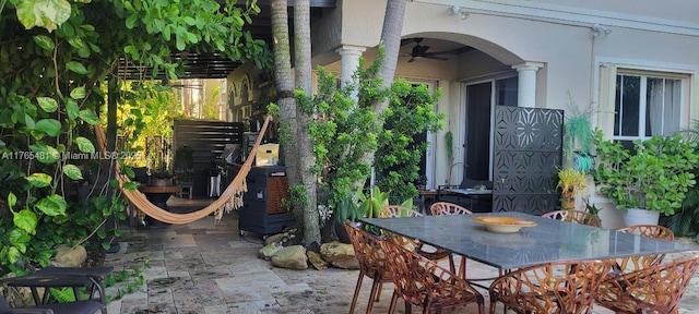 949 Harbor Vw N, Hollywood, FL 33019 - view of patio featuring outdoor dining space and a ceiling fan