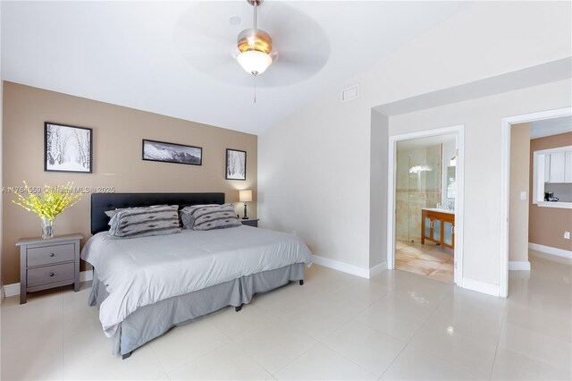 19852 NW 88th Ave, Hialeah, FL 33018 - tiled bedroom featuring lofted ceiling, ensuite bathroom, and a ceiling fan