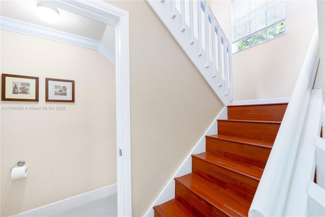 staircase with baseboards