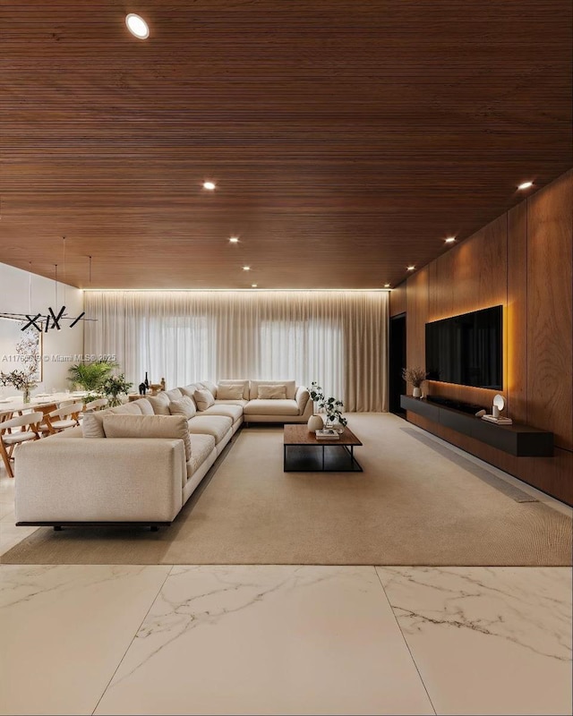 unfurnished living room featuring wood ceiling, marble finish floor, and recessed lighting