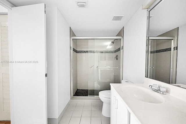 3300 NE 191st St Unit Lp03, Aventura, FL 33180 - full bathroom featuring a shower stall, toilet, tile patterned flooring, and vanity