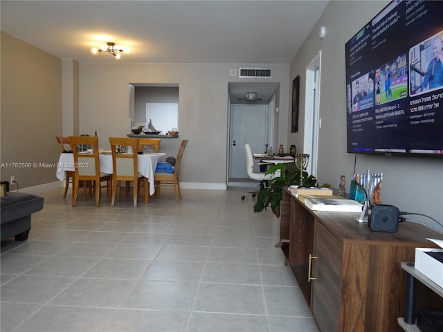 3725 S Ocean Dr Unit 607, Hollywood, FL 33019 - living area featuring light tile patterned flooring and baseboards