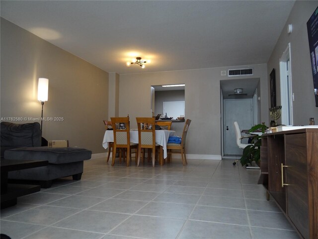 3725 S Ocean Dr Unit 607, Hollywood, FL 33019 - dining room featuring light tile patterned flooring and baseboards