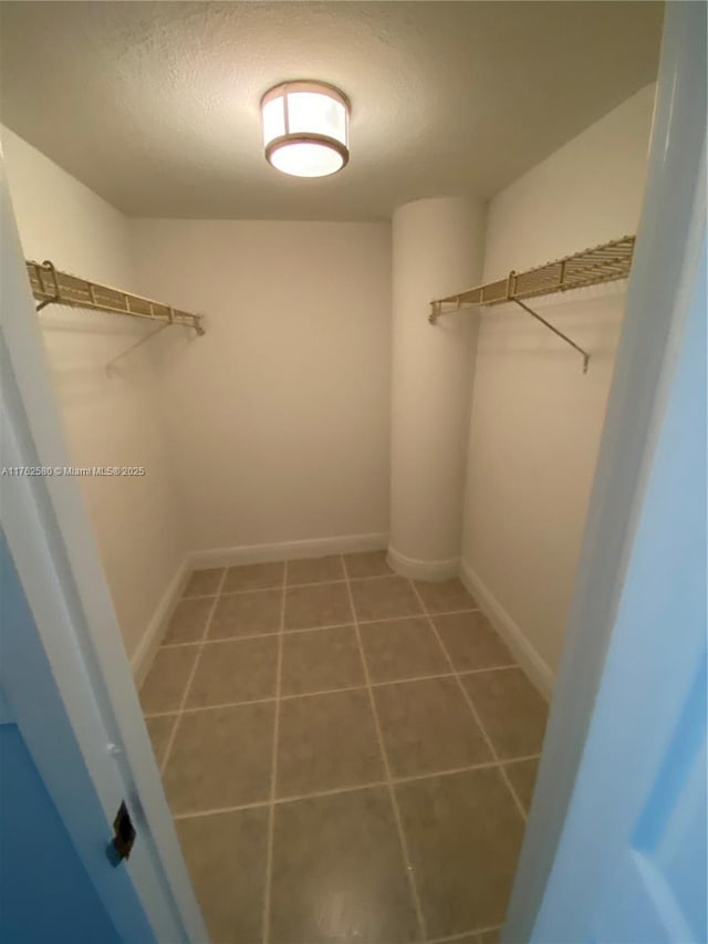 3725 S Ocean Dr Unit 607, Hollywood, FL 33019 - spacious closet with tile patterned flooring