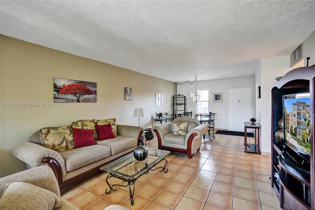 2811 Somerset Dr Unit 405, Lauderdale Lakes, FL 33311 - living area with light tile patterned floors, visible vents, and a textured ceiling