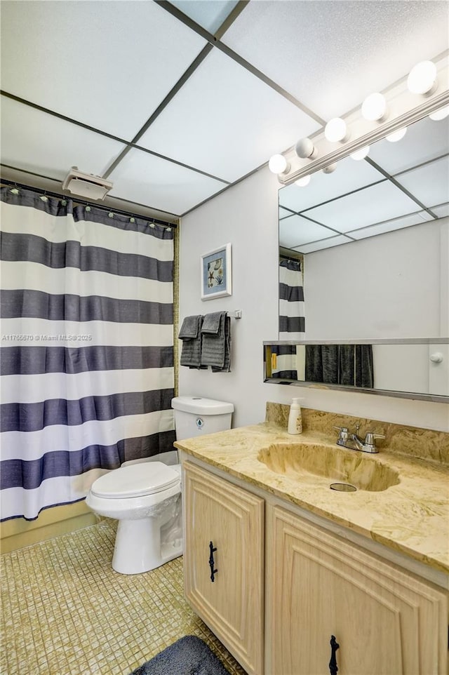 2811 Somerset Dr Unit 405, Lauderdale Lakes, FL 33311 - bathroom with tile patterned flooring, curtained shower, toilet, and vanity