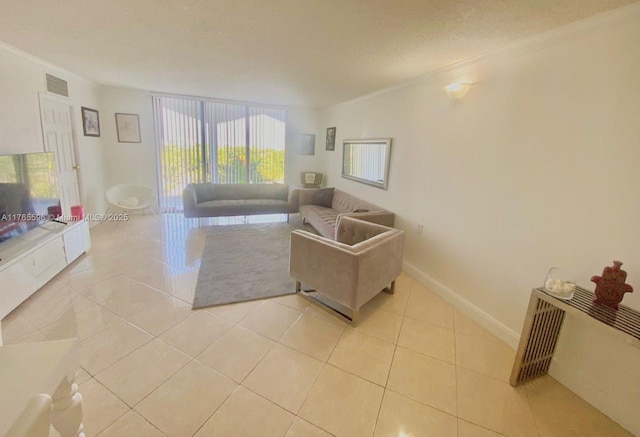 9801 Collins Ave Unit 8M, Bal Harbour, FL 33154 - living room featuring ornamental molding and light tile patterned flooring
