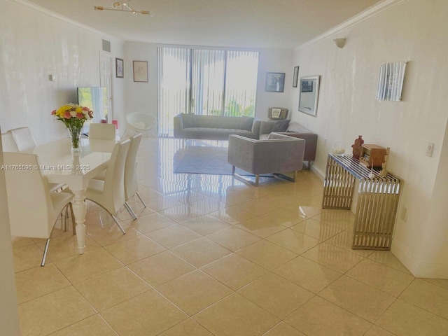 9801 Collins Ave Unit 8M, Bal Harbour, FL 33154 - living room featuring crown molding and light tile patterned flooring