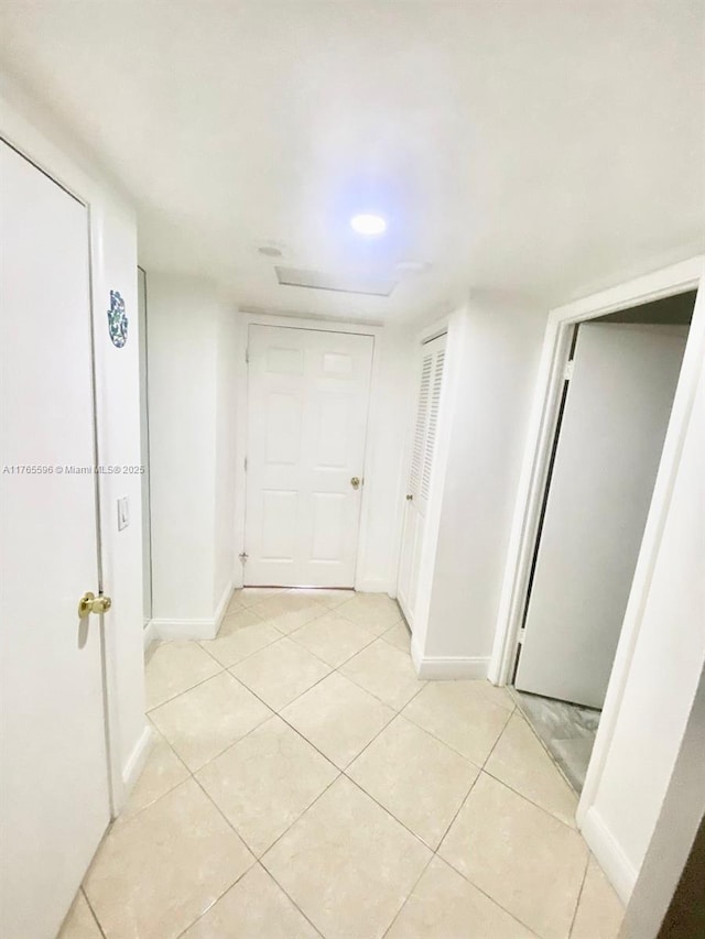 9801 Collins Ave Unit 8M, Bal Harbour, FL 33154 - hall featuring light tile patterned floors