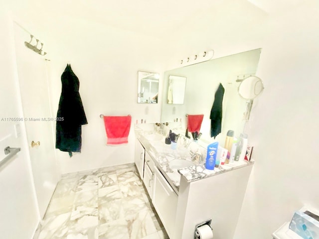 9801 Collins Ave Unit 8M, Bal Harbour, FL 33154 - full bathroom featuring double vanity and marble look tiles