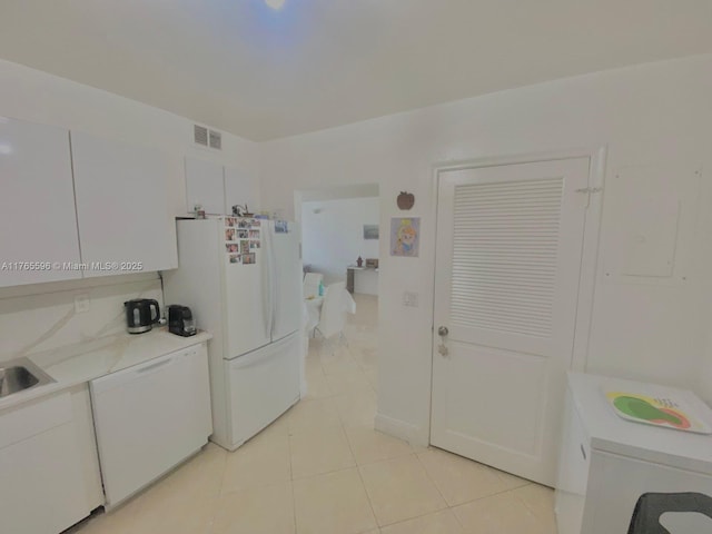 9801 Collins Ave Unit 8M, Bal Harbour, FL 33154 - washroom with light tile patterned floors and a sink