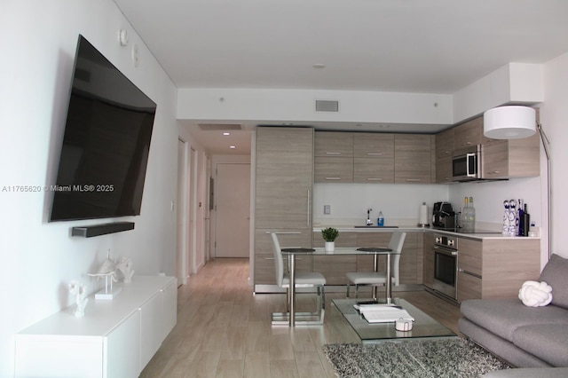 1300 S Miami Ave Unit 3108, Miami, FL 33130 - living area with visible vents and light wood-type flooring